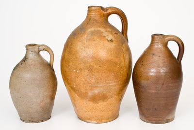 Three Connecticut Salt-Glazed Stoneware Jugs, early 19th century