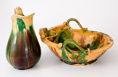 Multi-Glazed Shenandoah Valley Redware Pitcher and Washbowl Set, Strasburg, VA, circa 1890