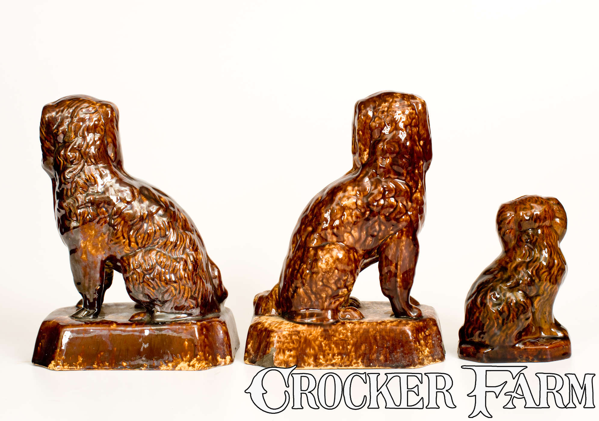 Spaniel Rockingham Three Rockingham-Glazed Spaniel Figures, second half 19th century ...