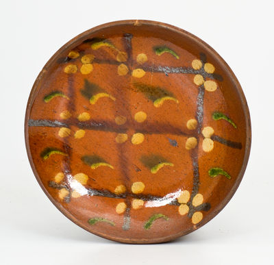 Exceptional Berks County, PA Redware Plate with Three-Color Slip Geometric Design