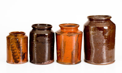 Four Glazed American Redware Jars, 19th century