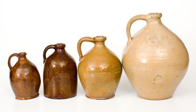 Four Glazed Northeastern U.S. Redware Jugs