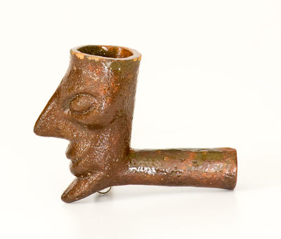 Rare Large-Sized Redware Face Pipe, possibly Southern origin, 19th century