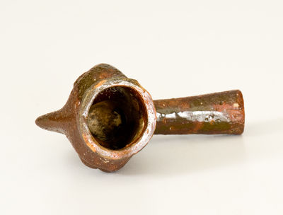 Rare Large-Sized Redware Face Pipe, possibly Southern origin, 19th century