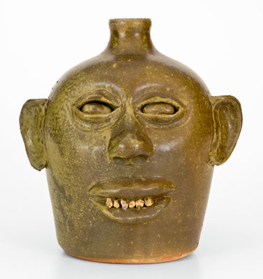 Rare Early-Period Lanier Meaders Stoneware Face Jug with Rock Teeth, Cleveland, Georgia, c1969