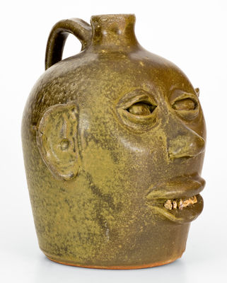 Rare Early-Period Lanier Meaders Stoneware Face Jug with Rock Teeth, Cleveland, Georgia, c1969