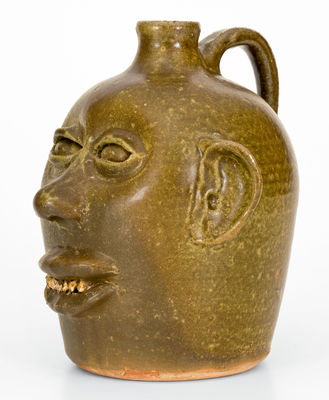 Rare Early-Period Lanier Meaders Stoneware Face Jug with Rock Teeth, Cleveland, Georgia, c1969