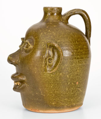 Rare Early-Period Lanier Meaders Stoneware Face Jug with Rock Teeth, Cleveland, Georgia, c1969