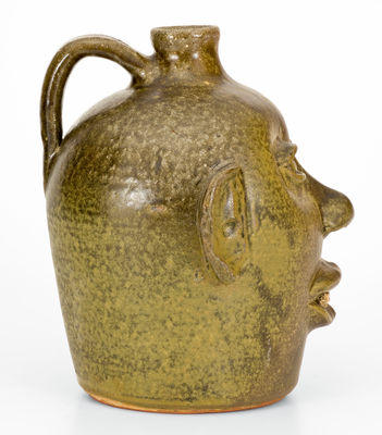 Rare Early-Period Lanier Meaders Stoneware Face Jug with Rock Teeth, Cleveland, Georgia, c1969