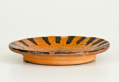 Fine Diminutive Slip-Decorated Redware Dish, possibly North Carolina