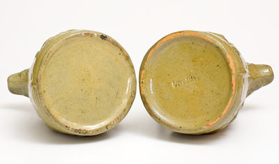 Extremely Rare Pair of JOHN BELL / WAYNESBORO Redware Pitchers with Molded Cherub Design