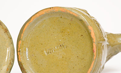 Extremely Rare Pair of JOHN BELL / WAYNESBORO Redware Pitchers with Molded Cherub Design