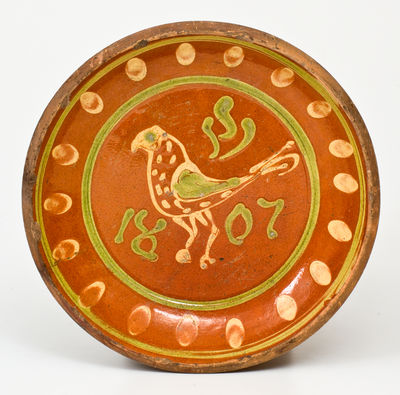 Exceptional Southeastern Pennsylvania Redware Dish with Two-Color Slip Bird Decoration, 1807