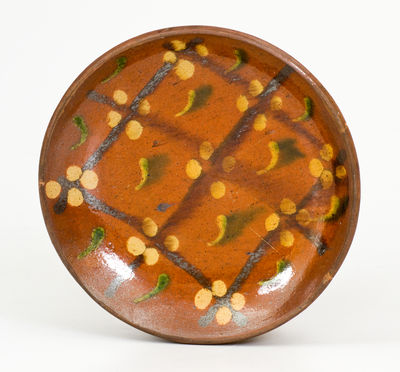 Exceptional Berks County, PA Redware Plate with Three-Color Slip Geometric Design