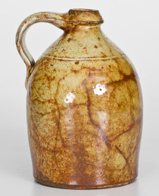 Exceptional Glazed New York State Redware Jug, mid 19th century