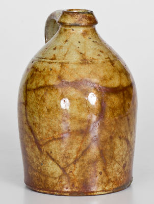 Exceptional Glazed New York State Redware Jug, mid 19th century