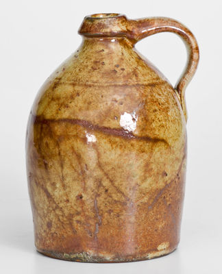 Exceptional Glazed New York State Redware Jug, mid 19th century