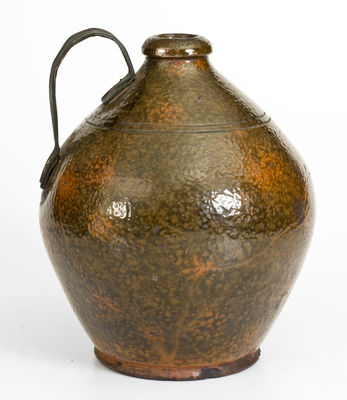 Copper-Glazed New England Redware Jug w/ Make-Do Handle, late 18th or early 19th century