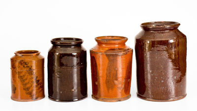 Four Glazed American Redware Jars, 19th century