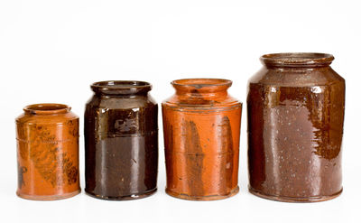 Four Glazed American Redware Jars, 19th century