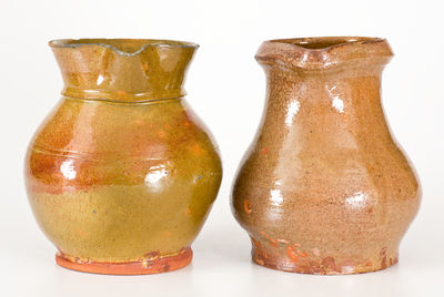 Two Glazed New York State Redware Pitchers, second or third quarter 19th century.
