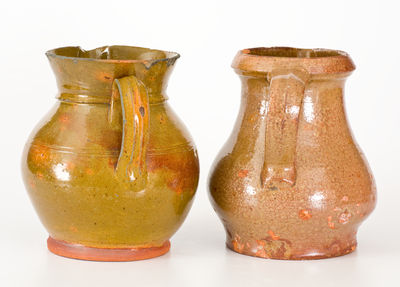 Two Glazed New York State Redware Pitchers, second or third quarter 19th century.