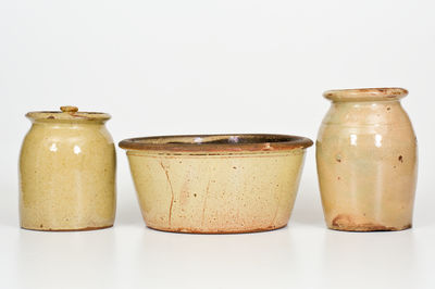 Three Pieces of Glazed Redware, probably NY State origin, second half 19th century