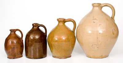 Four Glazed Northeastern U.S. Redware Jugs