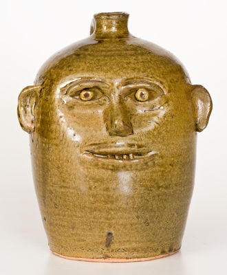 Alkaline-Glazed REGGIE MEADERS (Georgia) Stoneware Face Jug, late 20th century