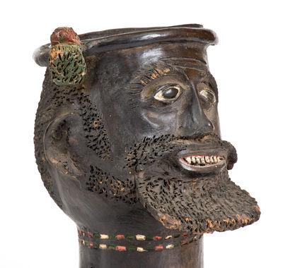 Rare Cold-Painted Stoneware Face Urn, late 19th or 20th century