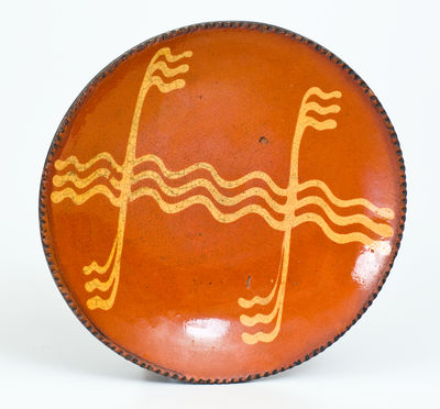 Philadelphia Redware Plate with Yellow Slip Decoration