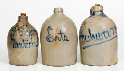 Three Cobalt-Decorated American Stoneware Advertising Jugs