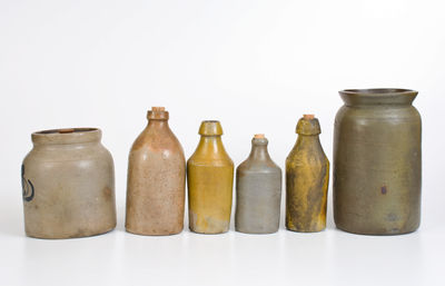 Lot of Six: Stoneware Vessels incl. Four Bottles, J. SWANK & CO. Jar, Unmarked Van Schoik & Dunn Jar