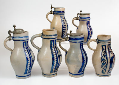 Lot of Six: Elaborate German Stoneware Tankard Pitchers, Nineteenth Century