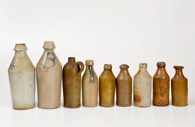 Lot of Nine: Nineteenth Century Stoneware Bottles, primarily American