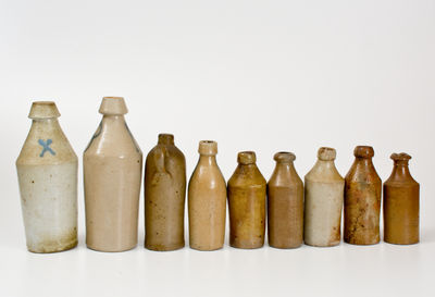 Lot of Nine: Nineteenth Century Stoneware Bottles, primarily American