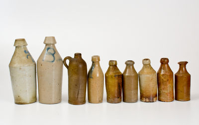 Lot of Nine: Nineteenth Century Stoneware Bottles, primarily American