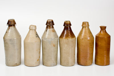 Lot of Six: Stoneware Bottles, primarily Northeastern United States, 19th century