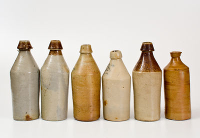 Lot of Six: Stoneware Bottles, primarily Northeastern United States, 19th century