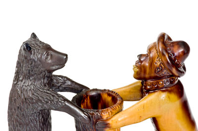 Exceedingly Rare and Important Pennsylvania Redware Preacher and Bear Figure