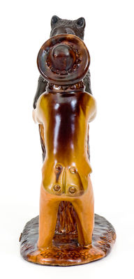 Exceedingly Rare and Important Pennsylvania Redware Preacher and Bear Figure
