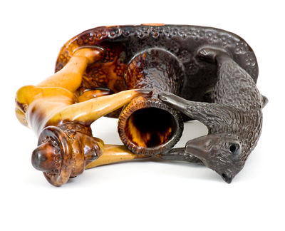 Exceedingly Rare and Important Pennsylvania Redware Preacher and Bear Figure