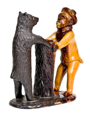 Exceedingly Rare and Important Pennsylvania Redware Preacher and Bear Figure