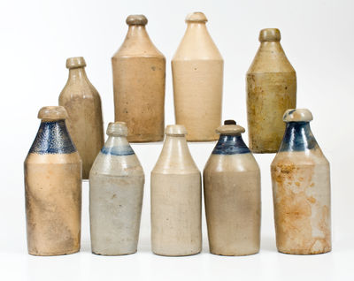 Lot of Nine: Stoneware Bottles incl. Dated and Cobalt Decorated Examples