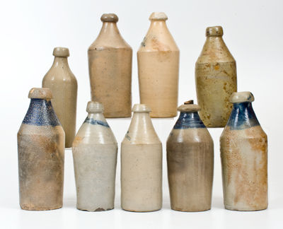 Lot of Nine: Stoneware Bottles incl. Dated and Cobalt Decorated Examples