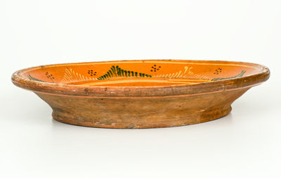 Exceptional Large-Sized Moravian Redware Bowl with Bird Decoration