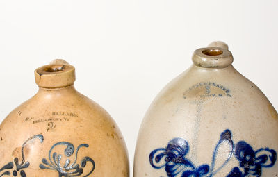 Lot of Two: Marked Northeastern U.S. Stoneware Jugs w/ Floral Decoration