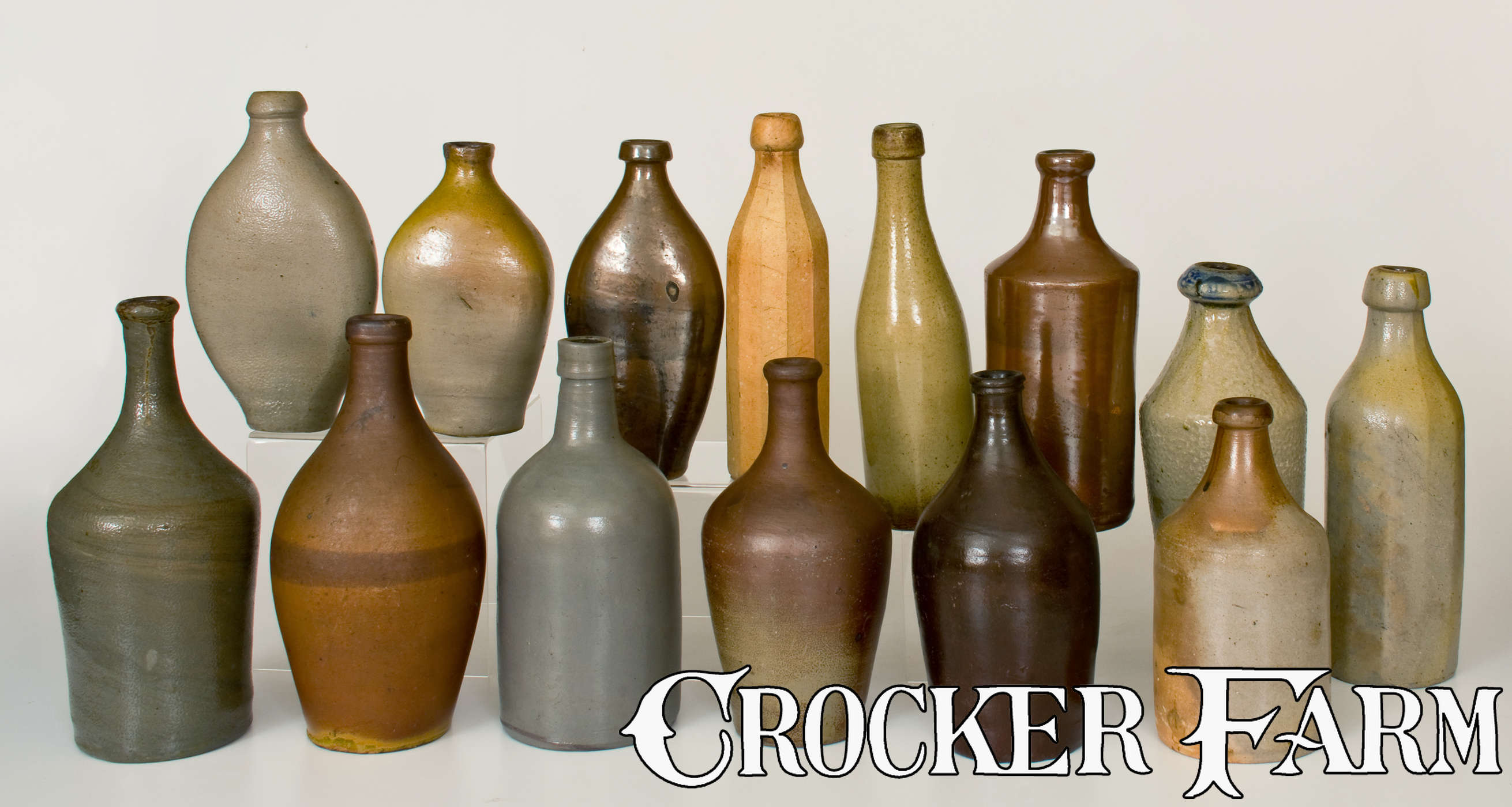 Flasks Fall Collection Lot of Fourteen: Stoneware Bottles and Flasks incl. Early Examples ...