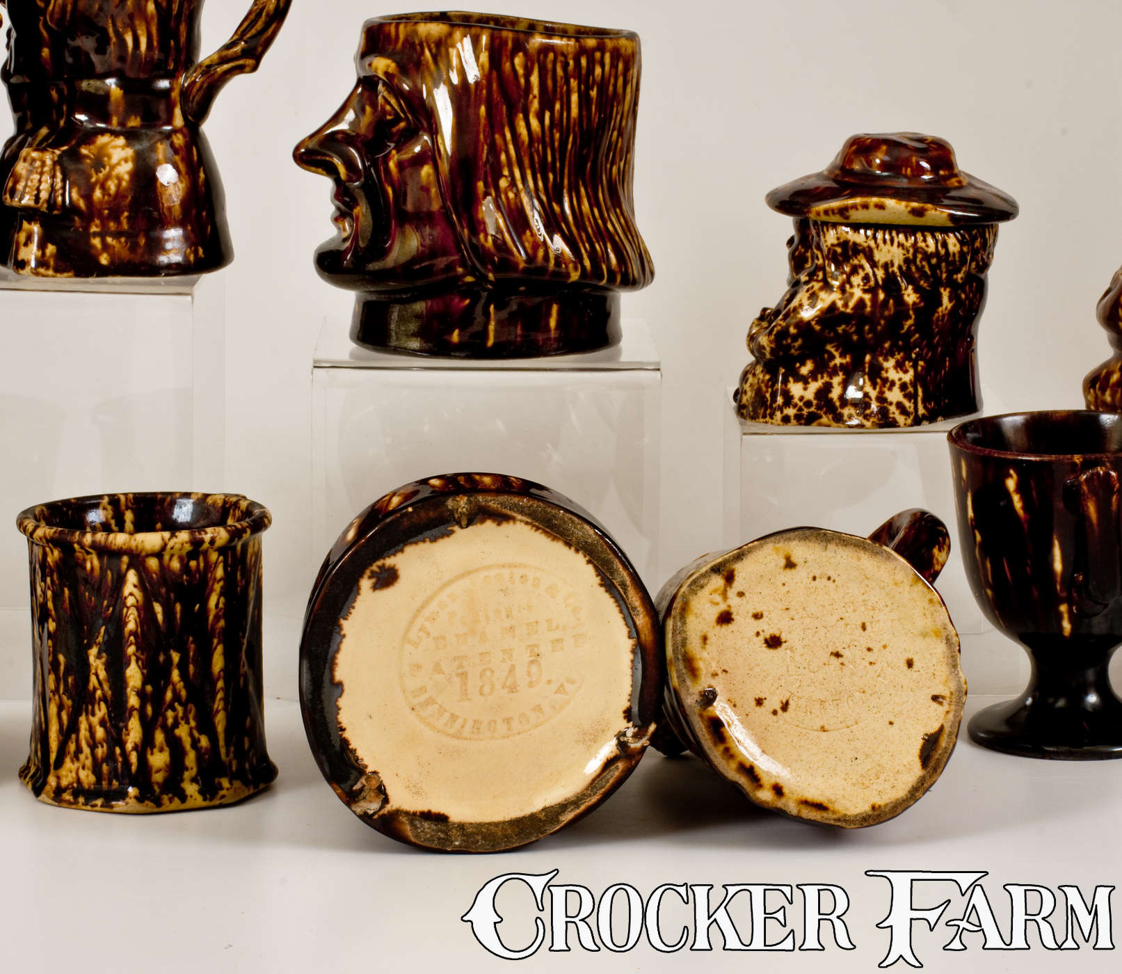 Rockingham Pottery Lot of Thirteen: Rockingham Ware Cups and Molded Figural Vessels -- Lot ...