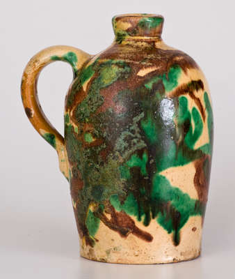 Exceptional Multi-Glazed Redware Jug, attrib. J. Eberly & Co. or S. Bell & Sons, Strasburg, VA